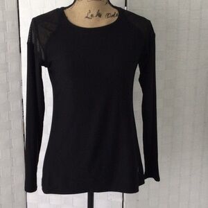 Woman’s top by Vogo size M long sleeves color black washable #454